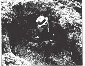 The hole at the top of the bank with the empty cracker box and string attached.