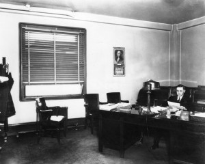 Coroner Frank Nance at his desk. [LAPL photo]