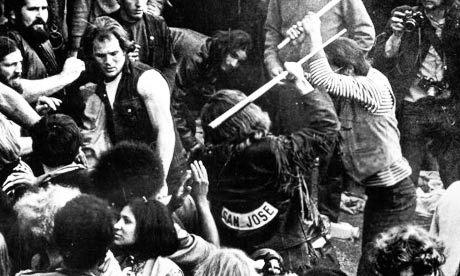 Hell's Angels attacking a concert goer at Altamont.
